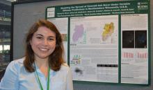 Stacey Olsen presents her research poster at AAG 2018